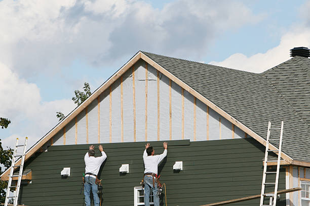 Professional Emergency Siding Repair technician working in Ostrander, OH